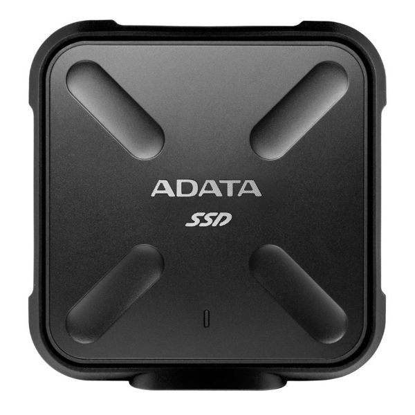 A hand gripping a small black box labeled "ADATA," showcasing the brand's logo prominently on the surface.